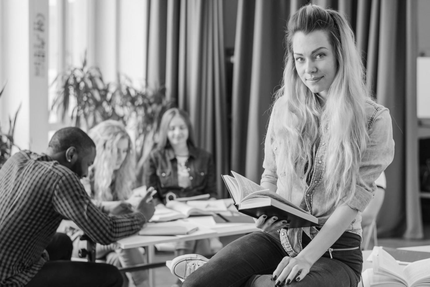 Professional testing environment showing multiple monitors with testing dashboards and quality metrics